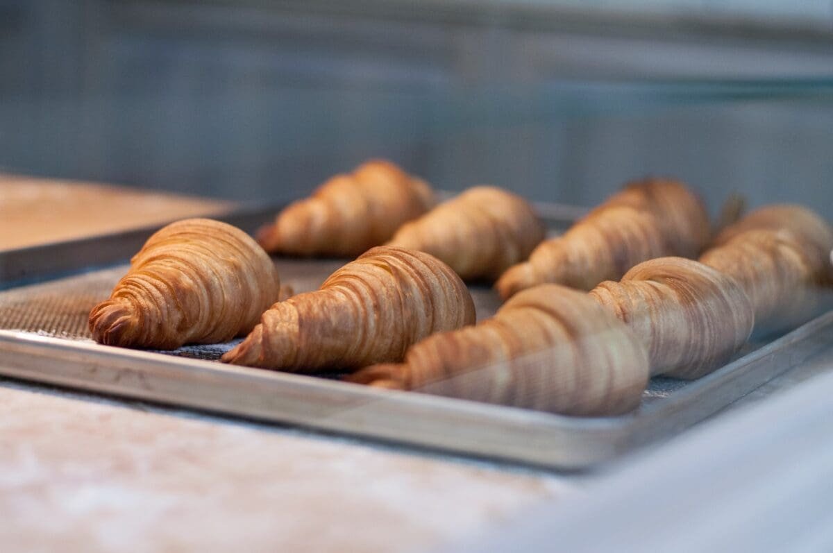 Freshly baked croissant/ https://franceunwrapped.com